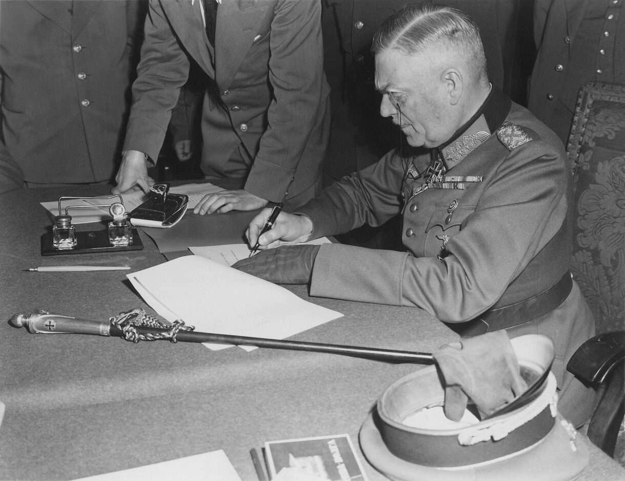 Field_Marshall_Keitel_signs_German_surrender_terms_in_Berlin_8_May_1945_Wikipedia